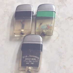 Three scripto Lighters